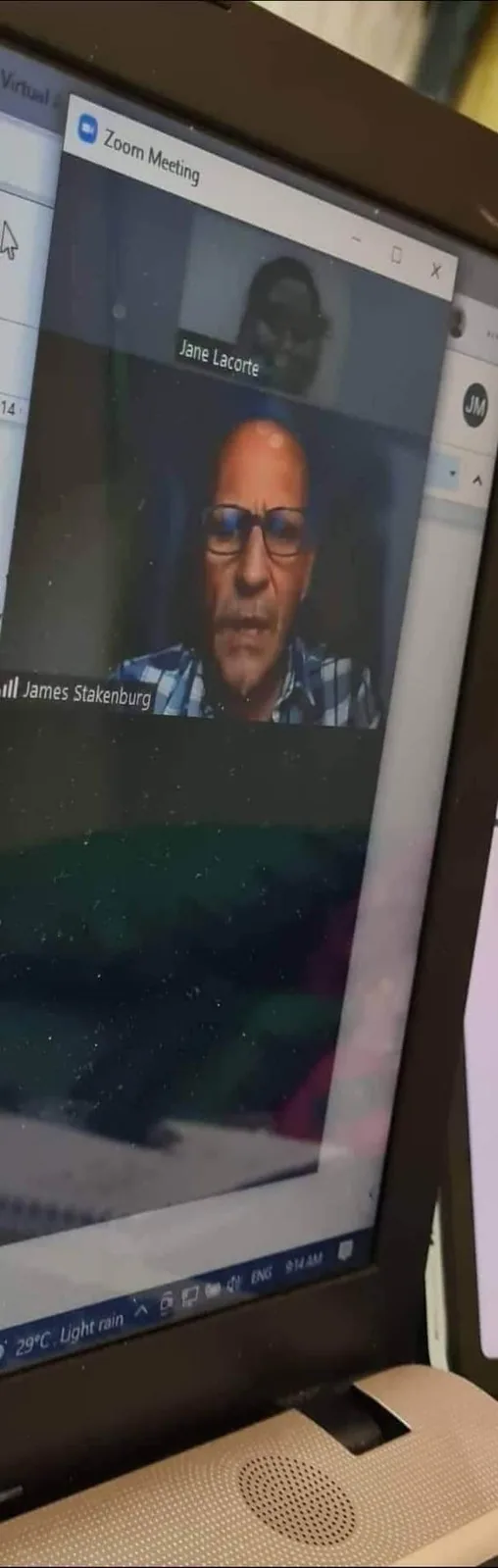 Jane on a Zoom meeting with a U.S.-based client
