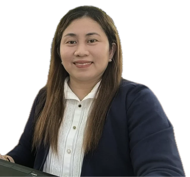 Jane Melody Lacorte smiling at her laptop