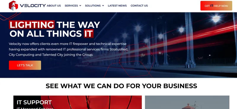 Velocity home page: dark blue hero reading “Lighting the way on all things IT” with a red Let’s talk button